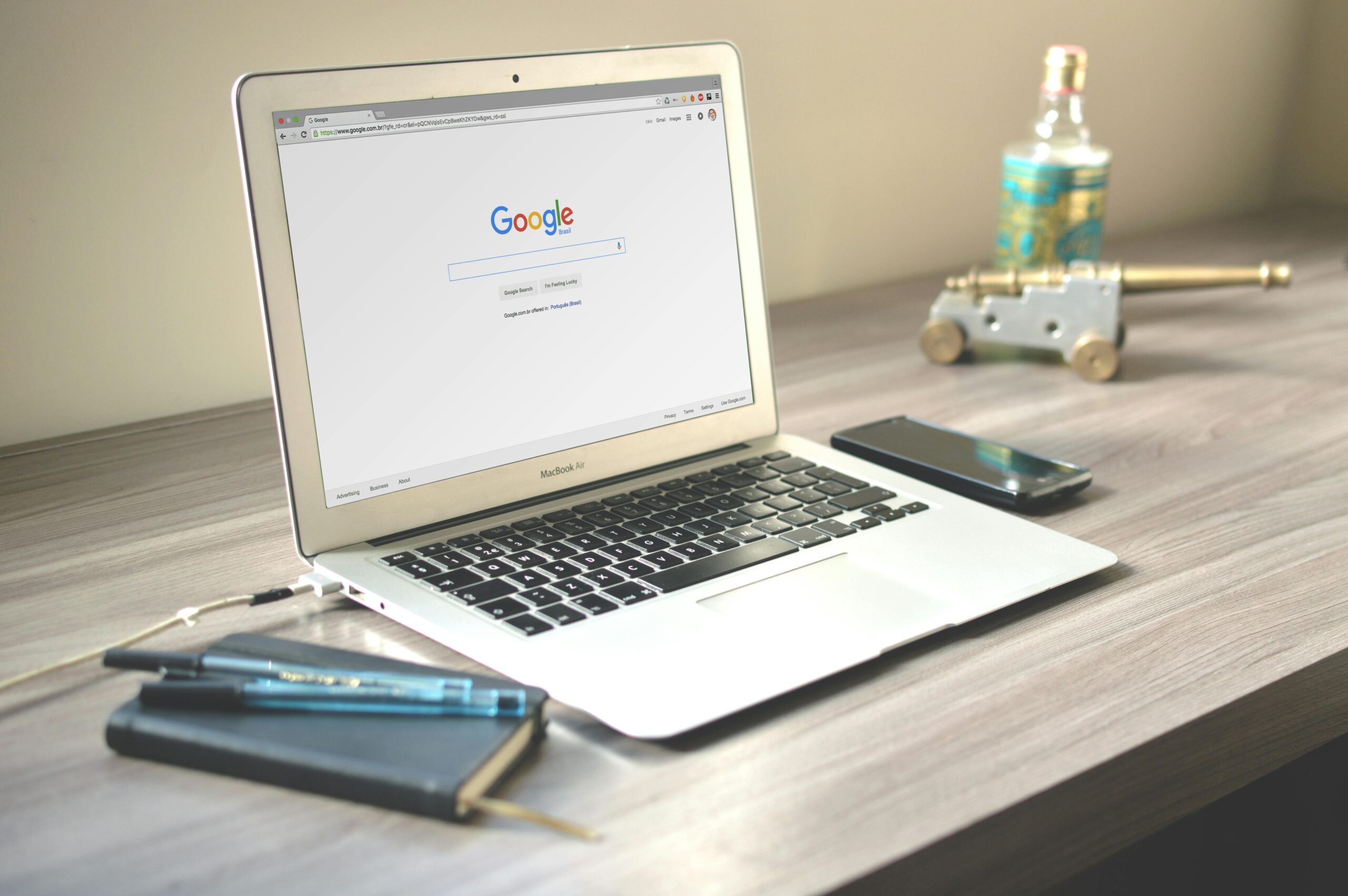 seo Macbook Air on Grey Wooden Table
